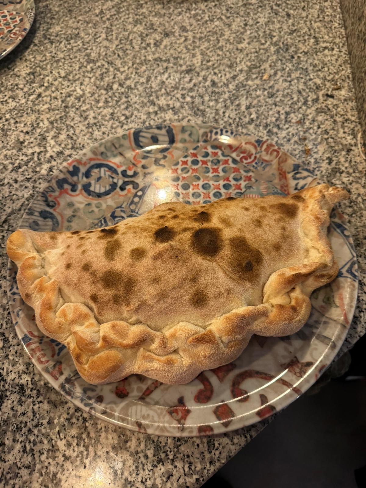 Calzone stuffed interleaved pizza